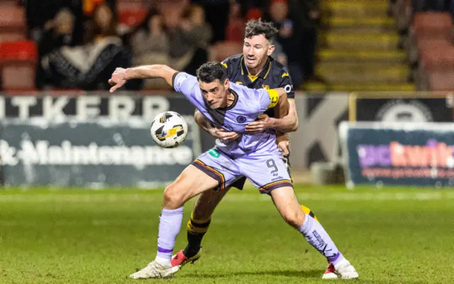 Brian Grahan and Ryan McGowan challenging for the ball earlier this evening