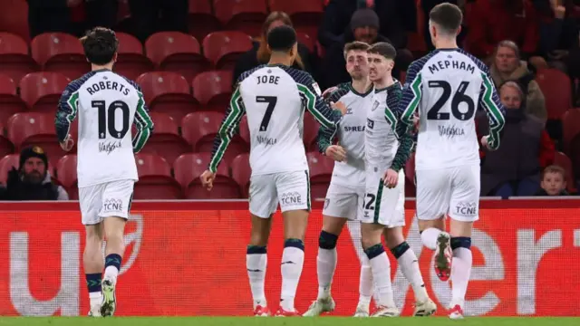 Sunderland players celebrate with goalscorer Dan Neil