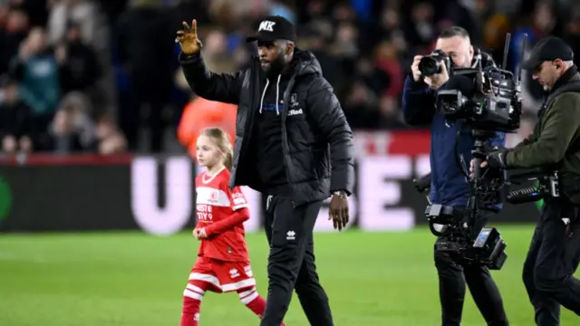 Kelechi Iheanaco is clapped onto the pitch at the Riverside