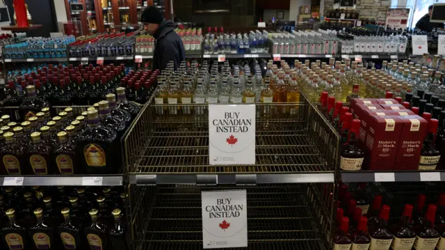 Signs on empty shelves suggest 'buy canadian instead'