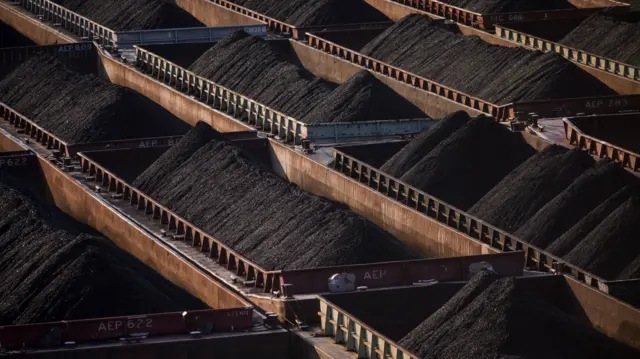 Coal on barges on the Monongahela River near the United States Steel Corp. Clairton Coke Works facility in Clairton, Pennsylvania, US