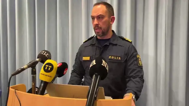 Orebro police chief Roberto Eid Forest is giving a news conference