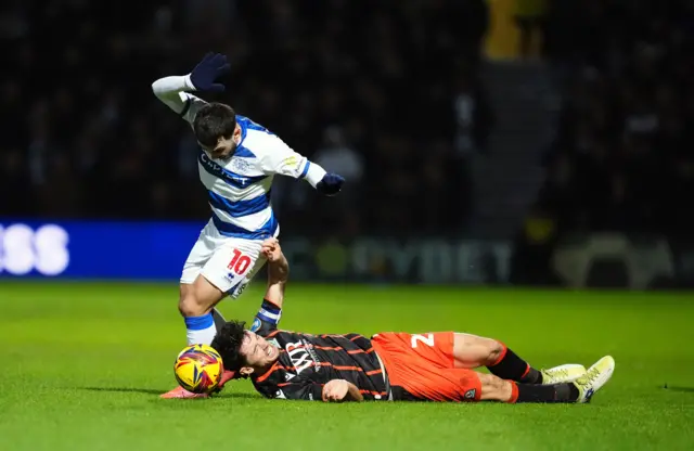 Queens Park Rangers' Ilias Chair (left) and Blackburn Rovers' Lewis Travis battle for the ball