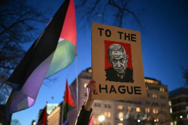 Protesters rally against Israeli Prime Minister Benjamin Netanyahu near the White House in Washington DC, where he is meeting US President Donald Trump