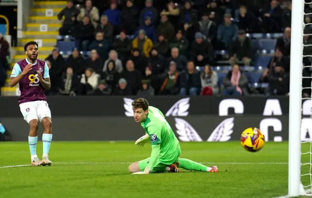 Burnley's Lyle Foster (left) attempts a shot on goal