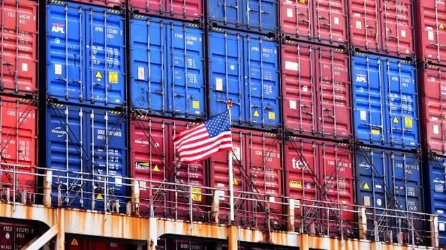 A U.S. flag is seen on the container ship President Eisenhower in a seaport in Qingdao city in east China