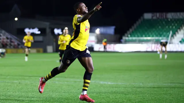 David Ajiboye of Newport County celebrates scoring a goal