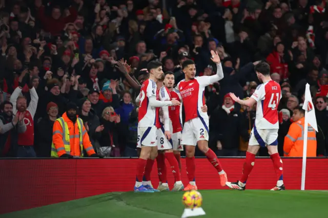 Arsenal celebrate a goal v Man City