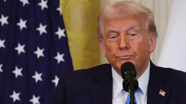 U.S. President Donald Trump looks on as he holds a joint press conference with Israeli Prime Minister Benjamin Netanyahu