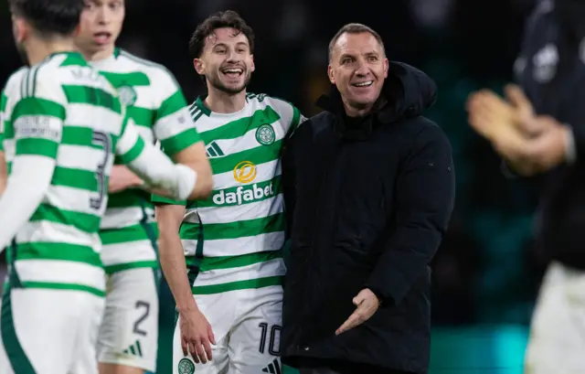 Rodgers, with one of his goalscorers, Nicolas Kuhn