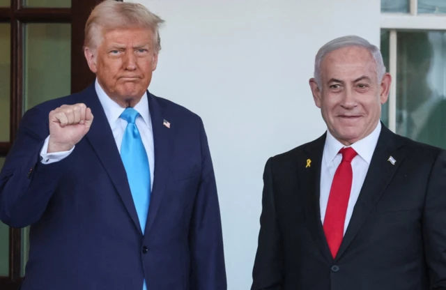 U.S President Donald Trump welcomes Israeli Prime Minister Benjamin Netanyahu at the entrance of the White House