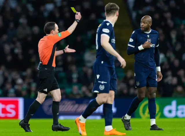 Mo Sylla is booked following the VAR penalty check