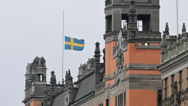 Swedish flag flies at half-mast on the government offices (Rosenbad) in Stockholm