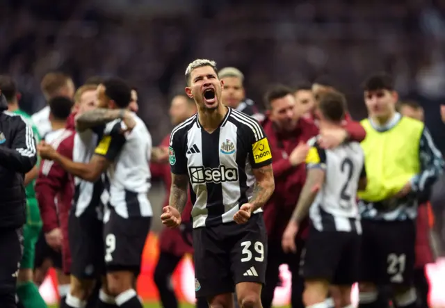 Guimaraes screams in delight in front of the home fans