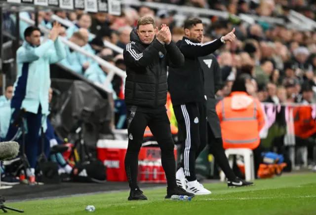 Howe claps his players from the touchline