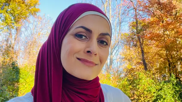 Laila El-Haddad wearing a red Hijab