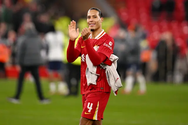 Virgil van Dijk of Liverpool applauds the fans