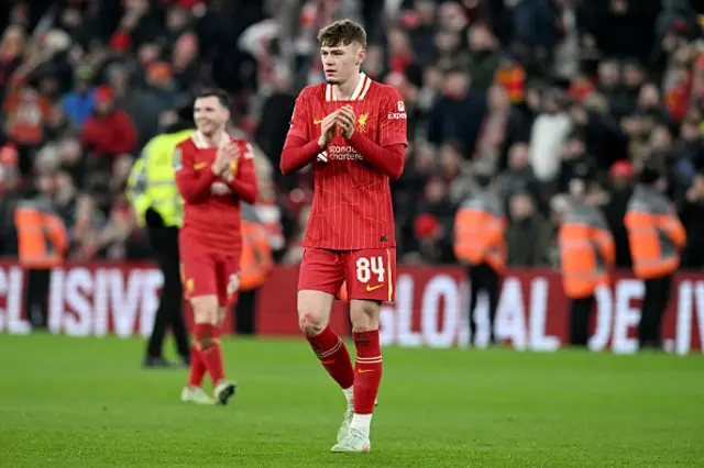 Conor Bradley of Liverpool applauds