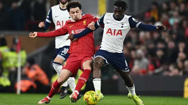 Tottenham Hotspur's Yves Bissouma in action with Liverpool's Curtis Jones