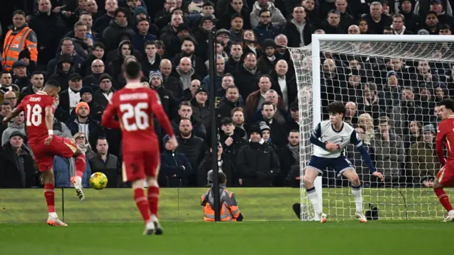 Liverpool's Cody Gakpo scores their first goal