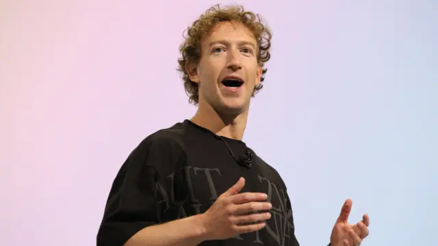 Mark Zuckerberg gestures with two hands as he speaks