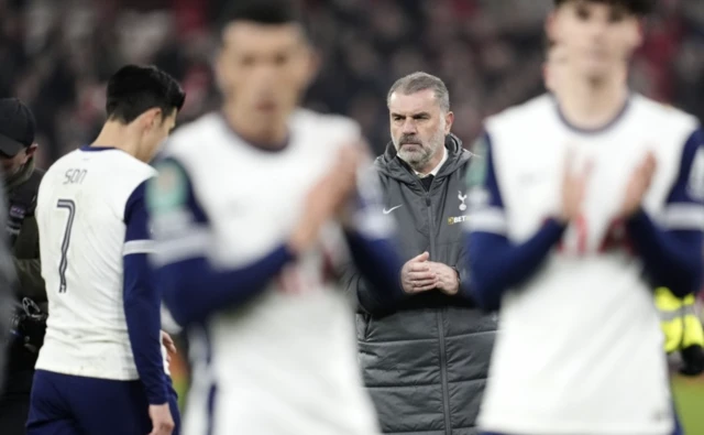 Tottenham Hotspur manager Ange Postecoglou (centre) applauds the fans