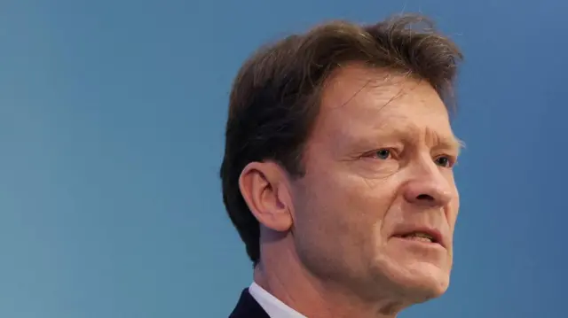 A file photo of Richard Tice in which he is wearing a suit and looking off camera