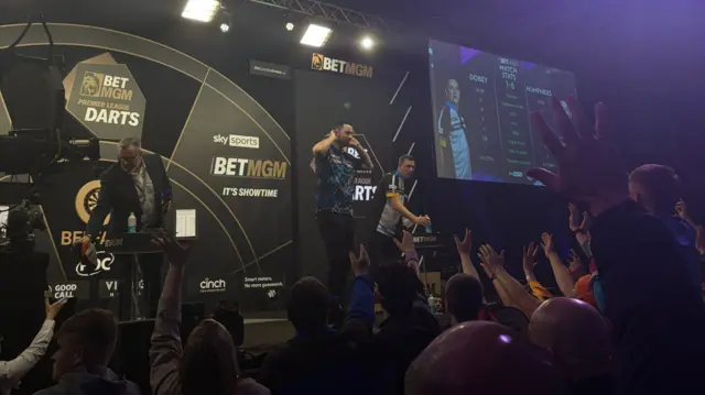 Luke Humphries celebrates his win in Belfast