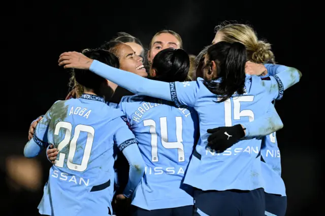 Mary Fowler of Manchester City celebrates with teamates