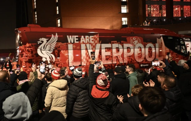 Liverpool fans as the team bus arrives outside the stadium