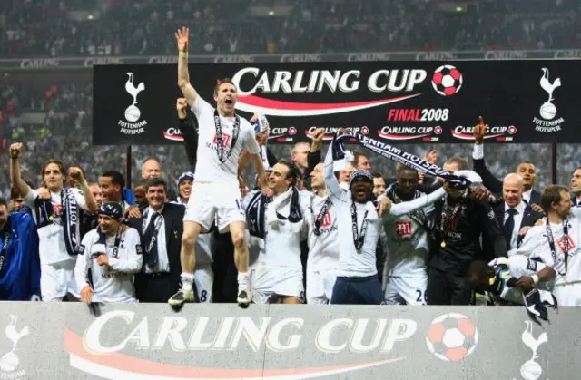 Robbie Keane of Tottenham Hotspur leads the celebrations following victory