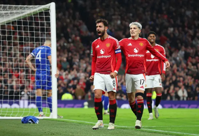 Bruno Fernandes of Manchester United celebrates scoring his team's fifth goal during the Carabao Cup Fourth Round match between Manchester United and Leicester City at Old Trafford.