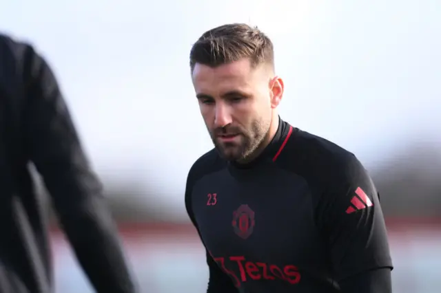 Luke Shaw of Manchester United takes part in the UEFA Europa League 2024/25 League Phase MD8 training and press conference at the Carrington Training complex.