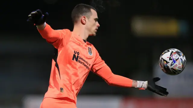 Northampton keeper kicks the ball