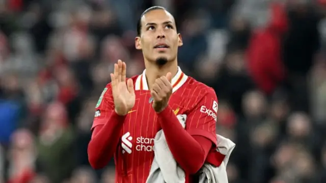 Virgil van Dijk claps the fans