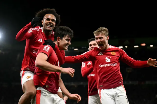 Manchester United celebrate a winning goal