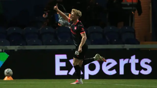 Cameron McGeehan celebrates scoring