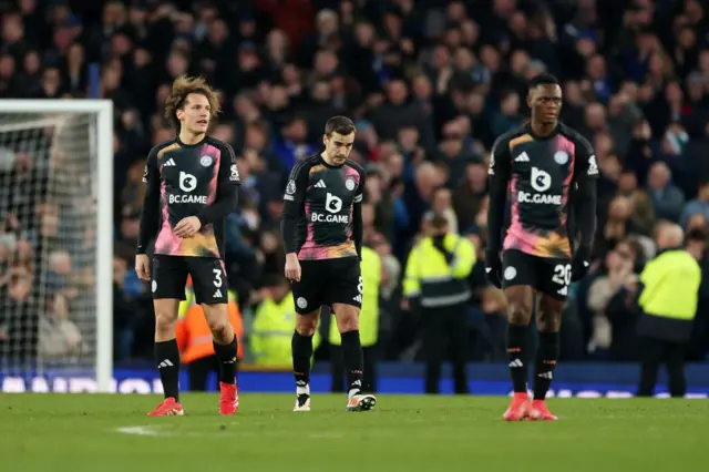 Harry Winks of Leicester City looks dejected.