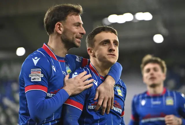 Joel Cooper celebrates his goal against Cliftonville