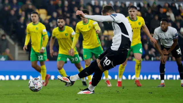 Jerry Yates strikes his equalising penalty