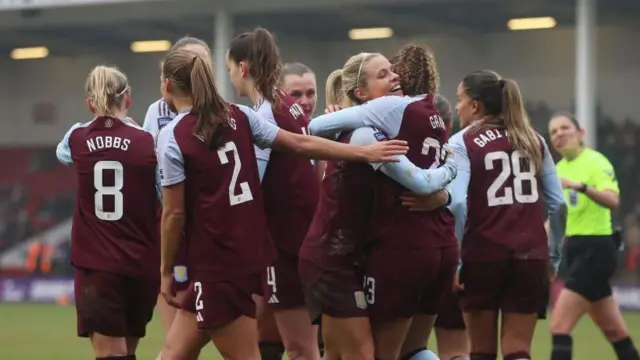 Aston Villa celebrate a goal against Brighton