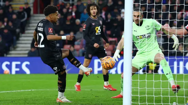 Burnley's Marcus Edwards scores their first goal