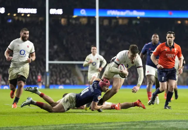 Tommy Freeman scoring a try