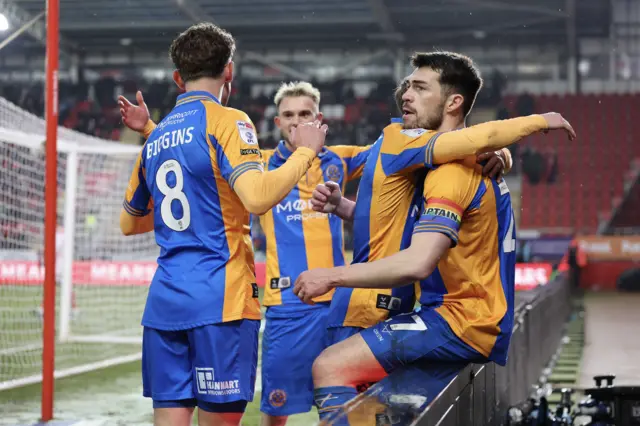 Shrewsbury Town players celebrate