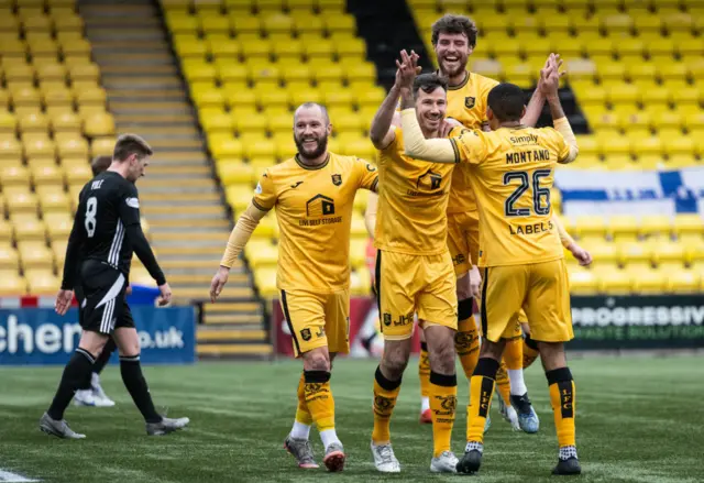 Ryan McGowan celebrates breaking the deadlock