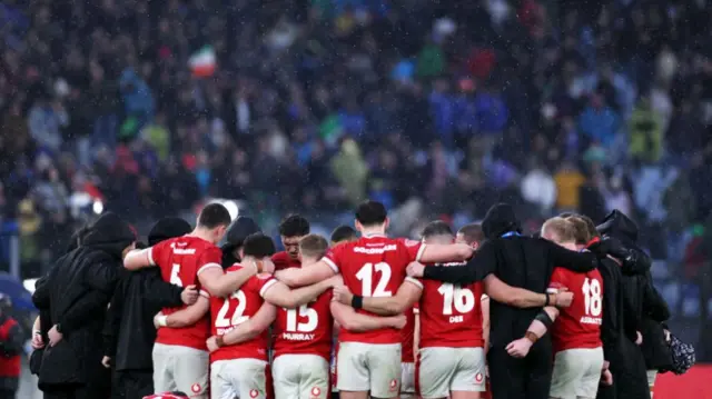 Wales huddle after the match