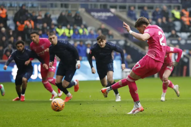 Ipswich Town's George Hirst scores their first goal from the penalty spot