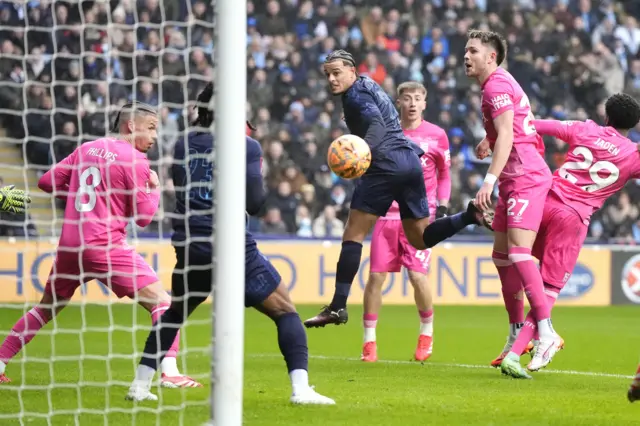 Coventry City's Joel Latibeaudiere scores their side's first goal of the game