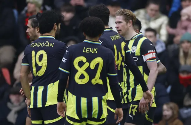 Manchester City's Kevin De Bruyne celebrates scoring their second goal with teammates