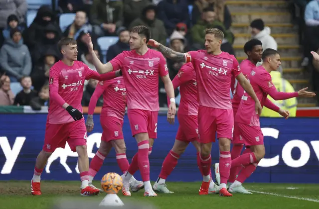 Ipswich Town's George Hirst celebrates scoring their first goal with teammates